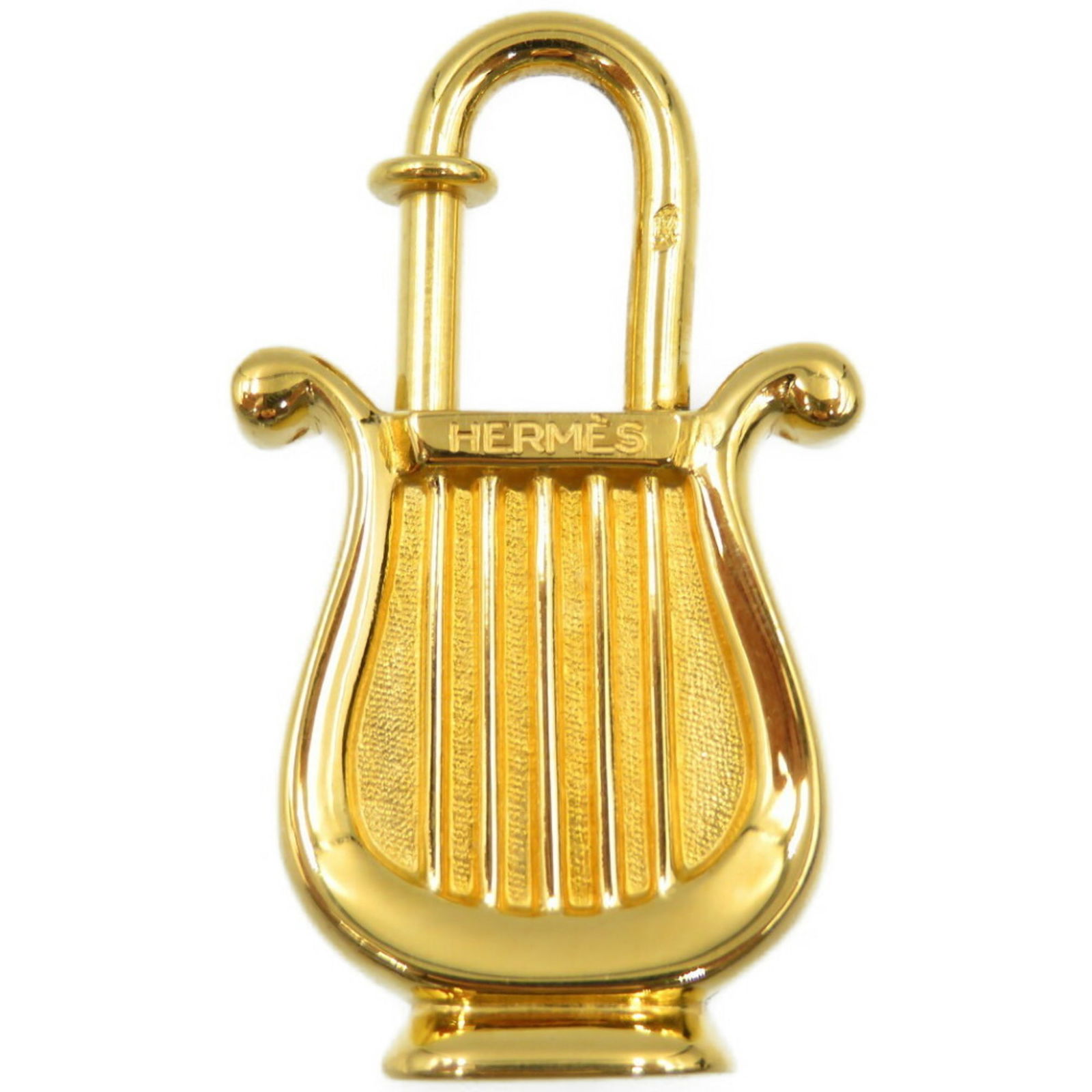 Hermes Cadena 1996 Limited GP Harp Gold Charm Keychain: Hermes Cadena 1996 Limited GP Harp Gold Charm Keychain Brand: Hermes Line: Cadena Type: Keyring Gender: Women Men Color: Gold Finish: Gold plated Size (HxWxD): 4cm x 2.3cm x 9.00mm / 1.57 x 0.9 x 0.35