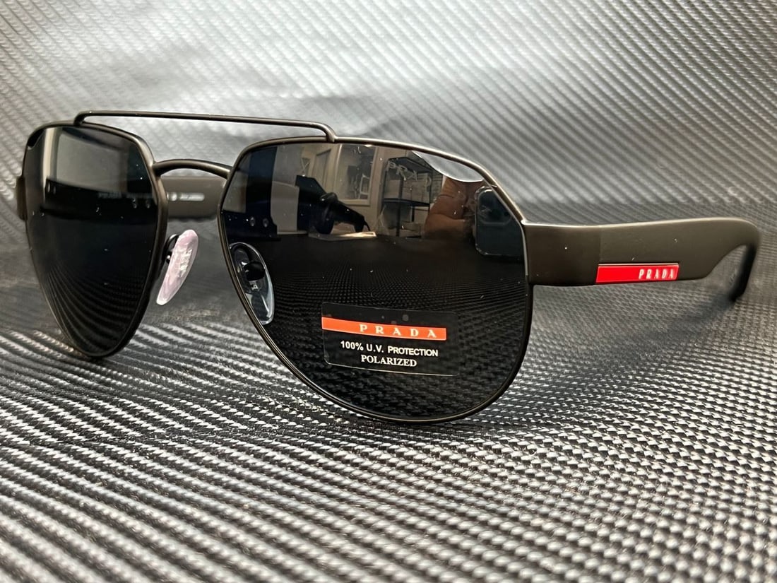 PRADA LINEA ROSSA PS 57US DG0571 Black Rubber Pilot 59 mm Mens Polarized Sungla: PRADA LINEA ROSSA PS 57US DG0571 Black Rubber Pilot 59 mm Mens Polarized Sungla Pattern: Solid Lens Technology: Anti-Reflective Polarized Frame Color: Black Uv Protection: UV400 Type: Sunglasses Lens 