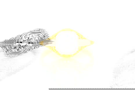 0.92 Carat Edwardian Engagement Ring: 0.92 Carat Edwardian Engagement Ring Antique Edwardian engagement ring finely crafted in 14k yellow gold and platinum with a transitional cut diamond at the center weighing 0.92 carat. Circa 1910. The