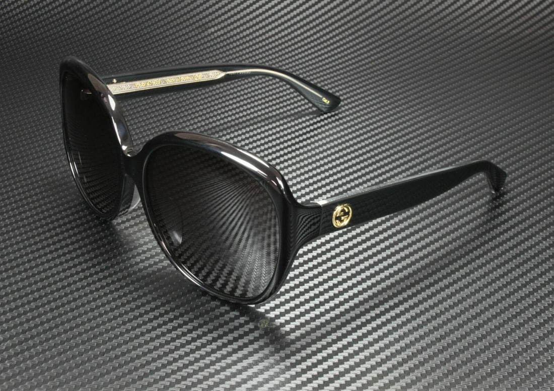 GUCCI GG0080Sk 001 Round Oval Black Grey Womens Sunglasses 61 mm: GUCCI GG0080Sk 001 Round Oval Black Grey Womens Sunglasses 61 mm Lens Material: Plastic Type: Sunglasses Frame Material: Acetate Frame Color: Black New The BIDHAUS Guarantee: All items in this auction