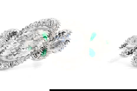Edwardian 1.30 Carat Old Mine Cut Diamond Ring with Emeralds: Edwardian 1.30 Carat Old Mine Cut Diamond Ring with Emeralds Finely crafted in platinum with an Old Mine cut center diamond weighing approximately 1.30 carats.Color G-H Clarity SI1The ring features di