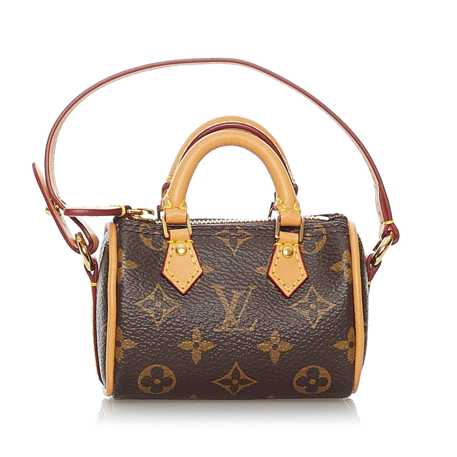 Louis Vuitton Monogram Micro Speedy Bag Charm: Louis Vuitton Monogram Micro Speedy Bag Charm The Micro Speedy features a monogram canvas body rolled vachetta leather handles a removable vachetta leather strap and a top zip closure. Brand: Louis Vu