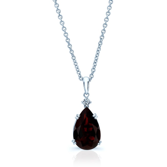 Garnet And Diamond Pendant In 14k White Gold On 18" Baby Curb Chain: Garnet And Diamond Pendant In 14k White Gold On 18" Baby Curb Chain Beautiful 14k White Gold Pendant Set With An Exquisite 14x9mm Pear Shape Garnet Accented With A Sparkling Brilliant Cut Diamond (h-i