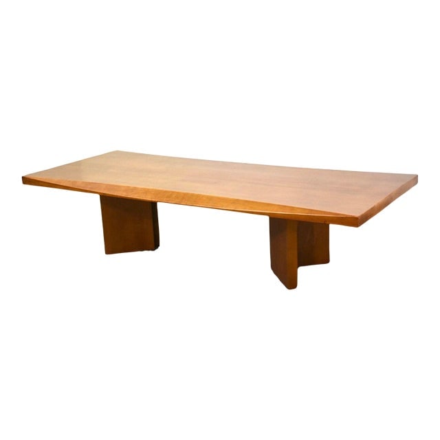 Maple Modern Coffee Table: Maple Modern Coffee Table A modern walnut coffee table with a beveled edge. 63.5" wide. 25.75". 15" tall. Dimensions: 63.5"W x 25.75"D x 15"H Styles: Modern Table Shape: Rectangle Period: 1990s Item T