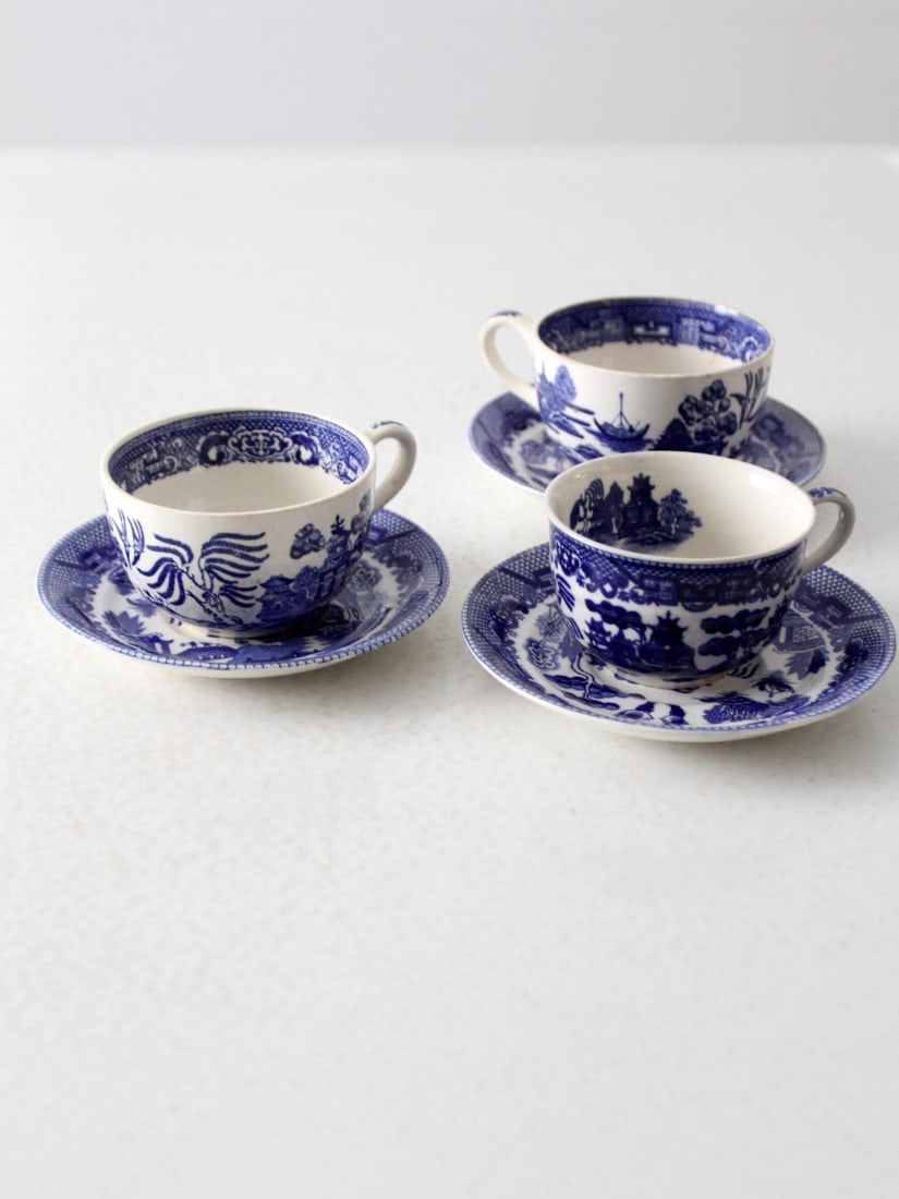 Vintage Blue Willow Tea Cups With Saucers Set: Vintage Blue Willow Tea Cups With Saucers Set This is a set of three vintage blue willow ware tea cups with saucers circa 1920s-1940s. The "mismatched" collection all feature the classic blue transfer
