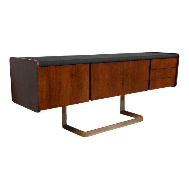 Ste-Marie Rosewood & Chrome Credenza: Ste-Marie Rosewood & Chrome Credenza This Ste-Marie and Laurent sideboard has beautiful rosewood grain and a black vinyl top. This mid century credenza floats on a modern chrome cantilever base and is