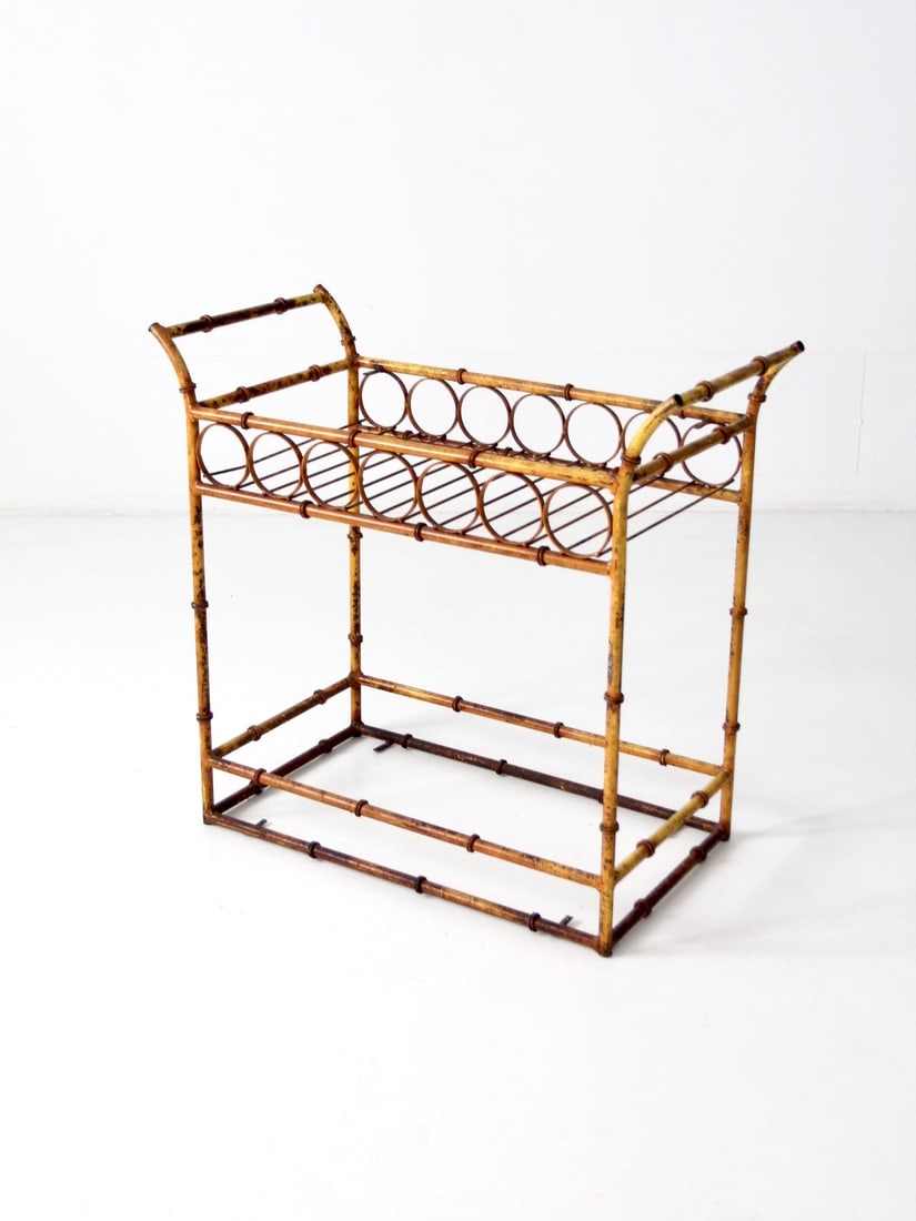 Vintage Industrial Bar Cart: Vintage Industrial Bar Cart This is a vintage industrial metal bar cart. The slender yellow metal stand features ring knobs that give it the appearance of bamboo. Rings at the top of the cart can be u
