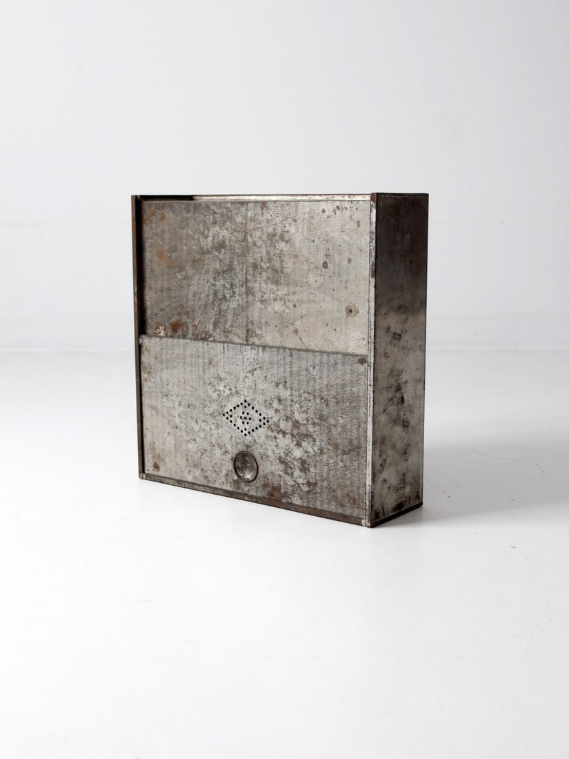 Vintage Metal Bread Box: Vintage Metal Bread Box A vintage metal bread box with sliding door. Beautifully weathered the aluminum box features a sliding door with a perforated vent. Height 19 inch 48.3 cm Length 18.5 inch 47 c