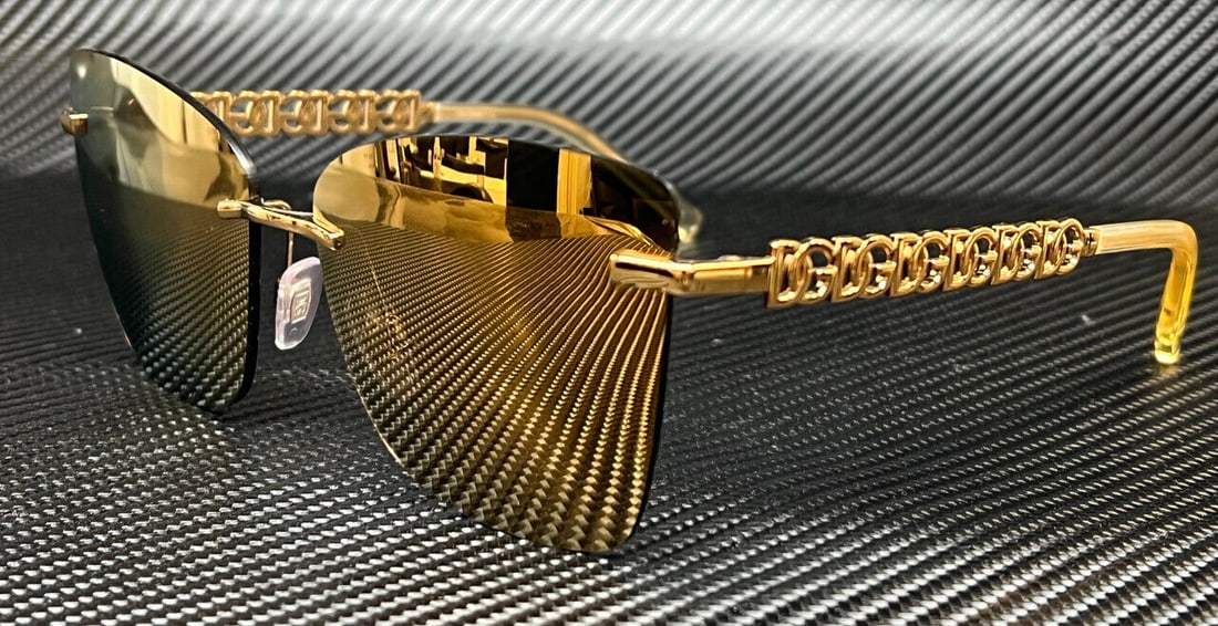 DOLCE & GABBANA DG2289 02 7P Gold Mirror Womens 59 mm Sunglasses: DOLCE & GABBANA DG2289 02 7P Gold Mirror Womens 59 mm Sunglasses Frame Color: Gold Type: Sunglasses New The BIDHAUS Guarantee: All items in this auction are guaranteed to be 100% authentic. At Your Se