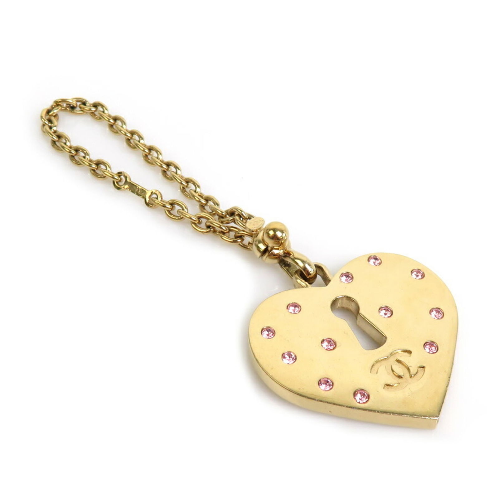 CHANEL Charm Coco Mark Heart Lock Metal/Rhinestone Gold/Pink Ladies: CHANEL Charm Coco Mark Heart Lock Metal/Rhinestone Gold/Pink Ladies Brand: Chanel Type: Handbag charm Gender: Women Girls Material: Metal Rhinestone Color: Gold Pink Stone: Rhinestone Size (HxWxD): 40