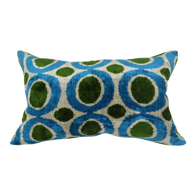 Silk Uzbek Ikat Velvet Hand Made Pillow Cushion: Silk Uzbek Ikat Velvet Hand Made Pillow Cushion Silk Uzbek Ikat Velvet Hand Made Pillow Cushion with natural linen backing and hidden zipper. 10/90 down feather insert is included. Dimensions: 24"W x 