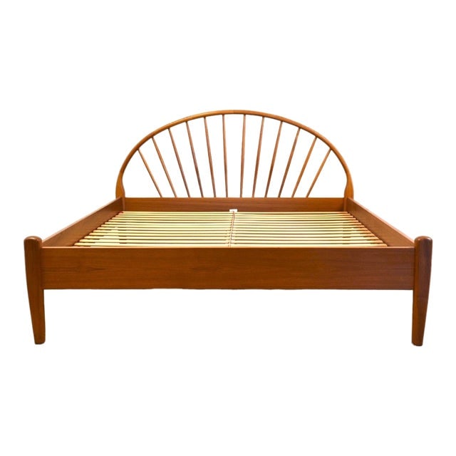 Danish Modern Teak Queen Bed: Danish Modern Teak Queen Bed A mid century modern teak queen size platform bed made by Jespersen. Made in Denmark. Footboard is 17.5" tall. Clearance under side rails is 9". 65" wide. 84.5" deep. 39.5