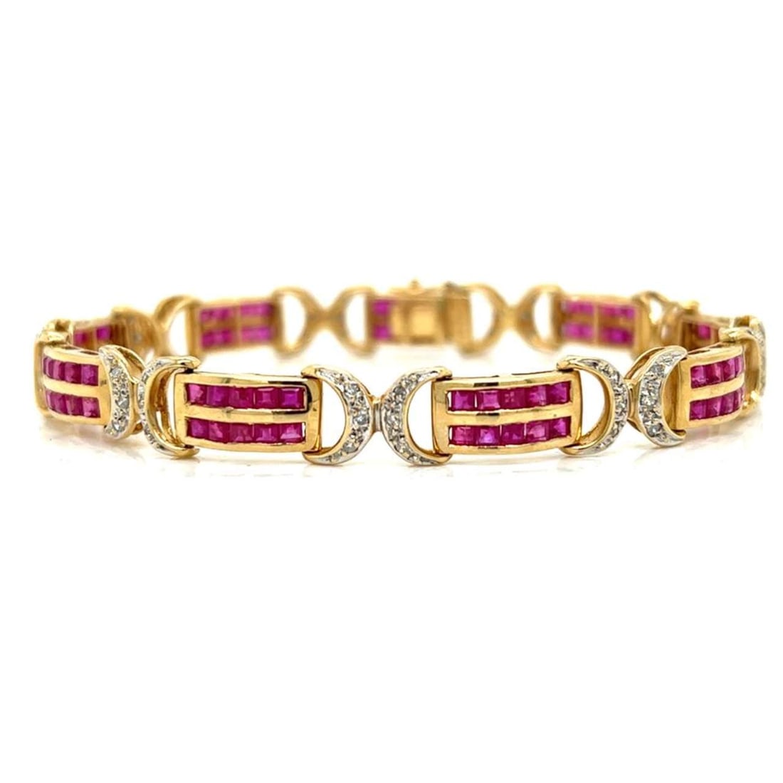 14K Yellow Gold Ruby & Diamond Bracelet: 14K Yellow Gold Ruby & Diamond Bracelet 14K Yellow Gold Ruby & Diamond Bracelet Weighing 15.6 grams Set with 88 Rubies weighing app. 7.00 Ct. And 54 Diamonds weighing app. 0.40 Ct. I-J Color, 