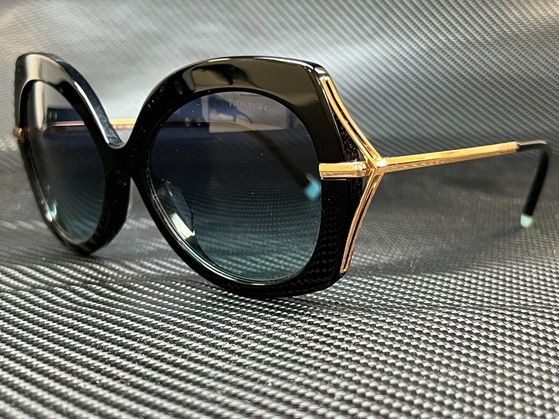 TIFFANY TF4169F 80019S Black Azure Blue Lens Womens Irregular Sunglasses 54mm: TIFFANY TF4169F 80019S Black Azure Blue Lens Womens Irregular Sunglasses 54mm Type: Sunglasses Frame Color: Black New The BIDHAUS Guarantee: All items in this auction are guaranteed to be 100% authent