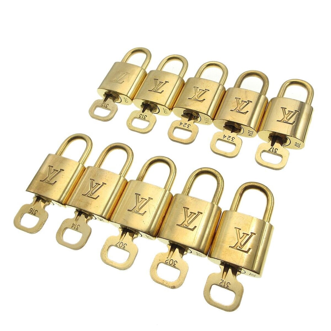Louis Vuitton Padlock & Key Bag Accessories Charm 10 Piece Set Gold: Louis Vuitton Padlock & Key Bag Accessories Charm 10 Piece Set Gold Type: Padlock Color: Gold Outside Condition: C: Heavily Used/Inside Condition: C: Heavily Used The BIDHAUS Guarantee: All items in t