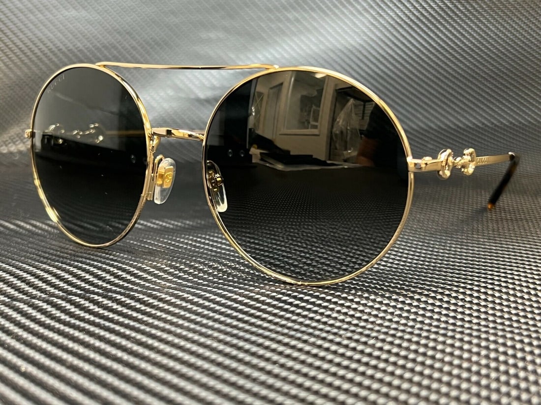 GUCCI GG0878S 001 Gold Round Womens 59 mm Sunglasses: GUCCI GG0878S 001 Gold Round Womens 59 mm Sunglasses Type: Sunglasses Frame Color: Gold Style: Round New The BIDHAUS Guarantee: All items in this auction are guaranteed to be 100% authentic. At Your S