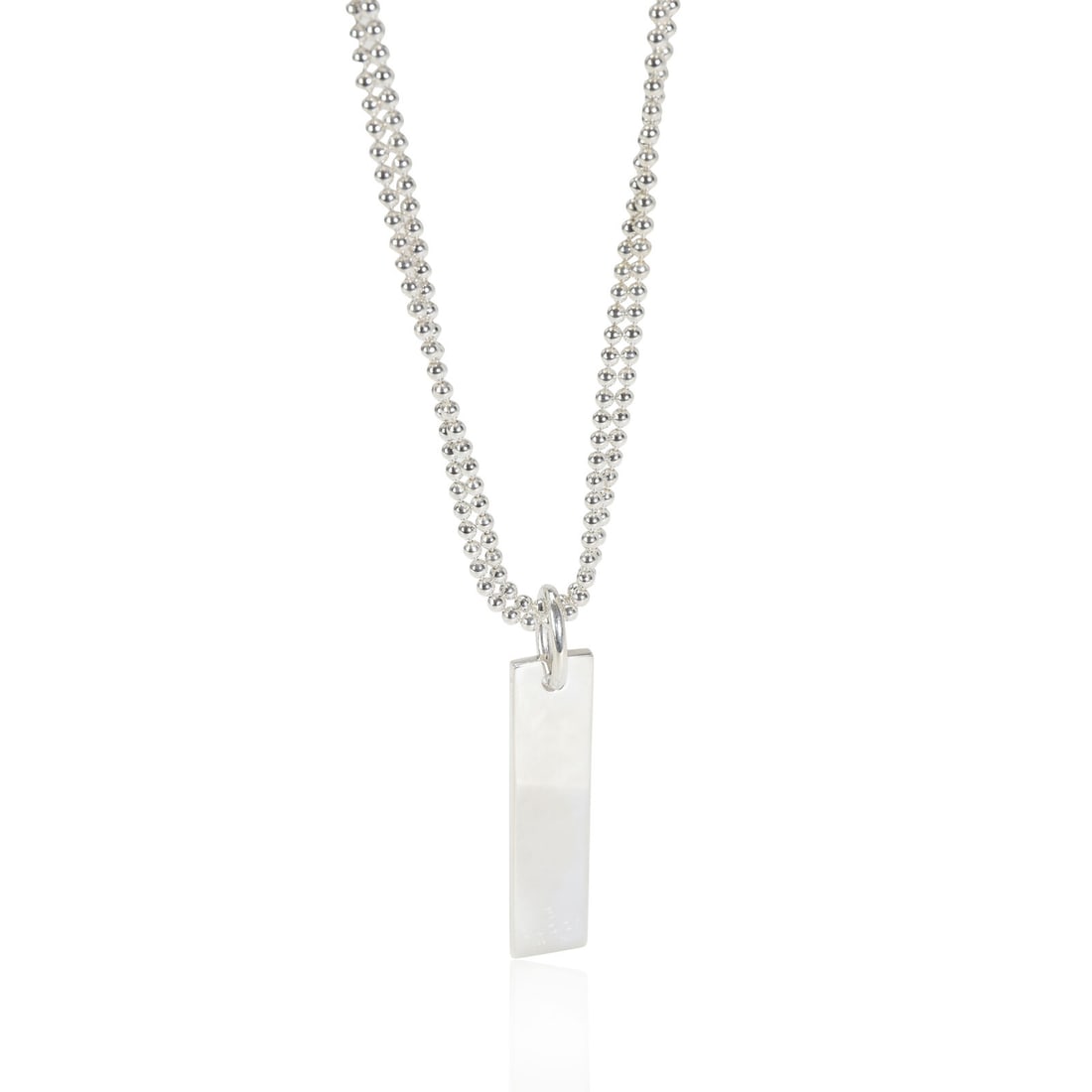 Gucci Tag Pendant on Double Bead Chain in Sterling Silver: Gucci Tag Pendant on Double Bead Chain in Sterling Silver In excellent condition and recently polished. Chain is 19 inches in length. Necklace Length: 19 in Side Stone Type: No Stone Metal Purity: 925