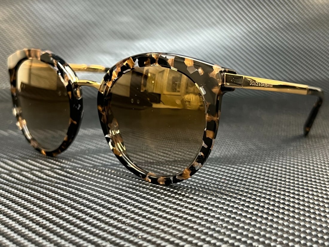 DOLCE & GABBANA DG4268 911 6E Cube Black Round Womens 52 mm Sunglasses: DOLCE & GABBANA DG4268 911 6E Cube Black Round Womens 52 mm Sunglasses Type: Sunglasses Frame Color: Black Style: Round New The BIDHAUS Guarantee: All items in this auction are guaranteed to be 100% a