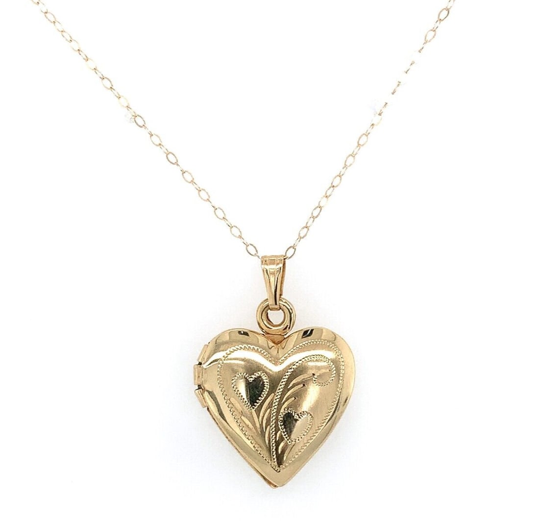 14k Yellow Gold Heart Locket Pendant with Engraved Hearts Jewelry: 14k Yellow Gold Heart Locket Pendant with Engraved Hearts Jewelry Pendant Shape: Heart Color: Gold Material: Metal Metal: Yellow Gold Main Stone: No Stone Type: Necklace Metal Purity: 14k Style: Locke