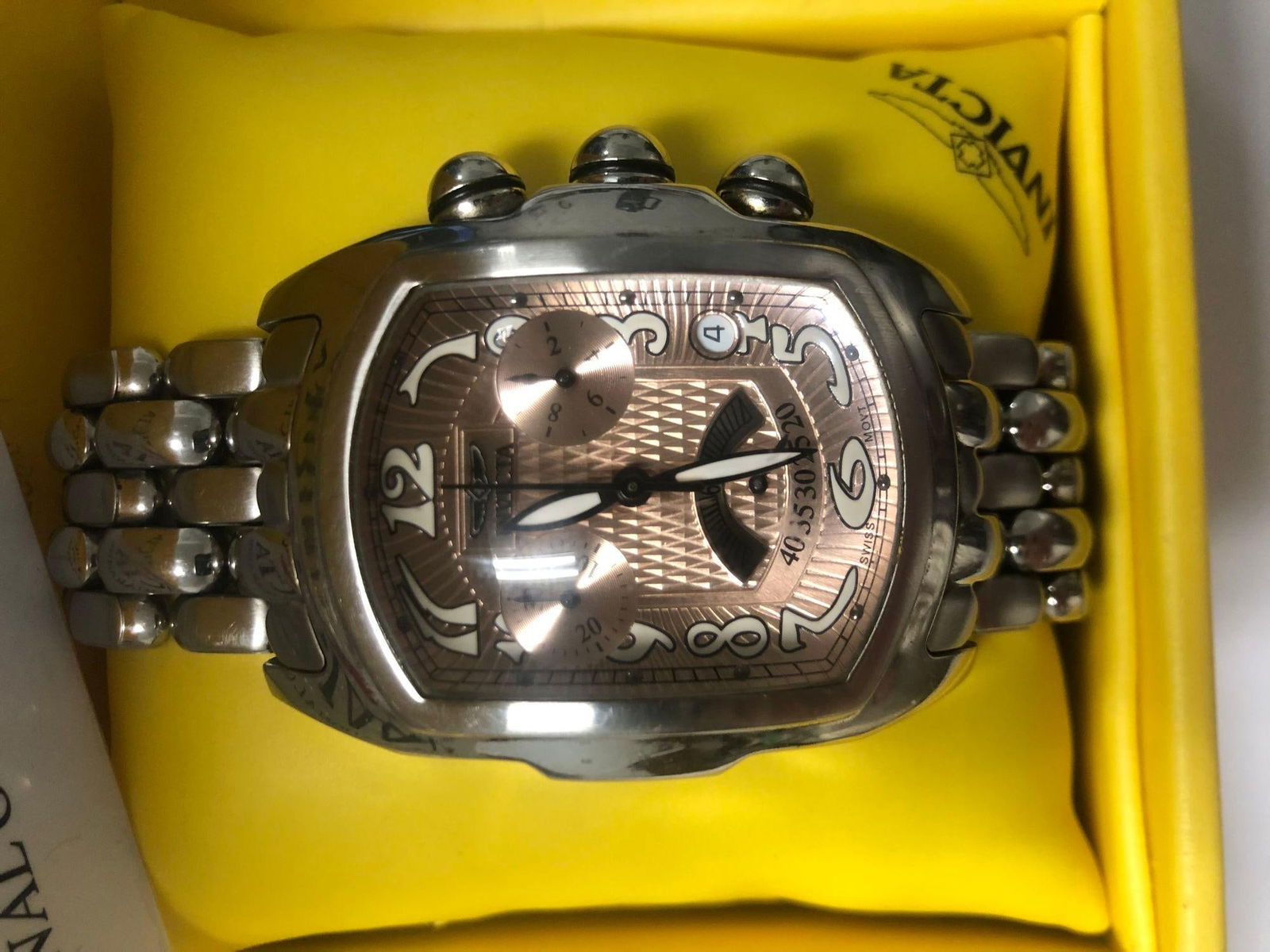 Invicta Mens Copper Face Watch Lupah Model no.2221: Invicta Mens Copper Face Watch Lupah Model no.2221 Dimensions: Height: 1.969 in (5.01 cm)Width: 1.772 in (4.51 cm)Depth: 1 in (2.54 cm) Materials and Techniques: Steel Period: 2000-2009 Date of Manufa