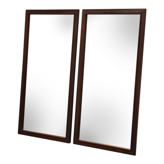Walnut Mid Century Modern Mirrors - a Pair: Walnut Mid Century Modern Mirrors - a Pair A pair of mid century modern walnut hanging wall mirrors. Dimensions: 22.75"W x 1"D x 44.75"H Styles: Mid-Century Modern Period: 1950s Item Type: Vintage Ant