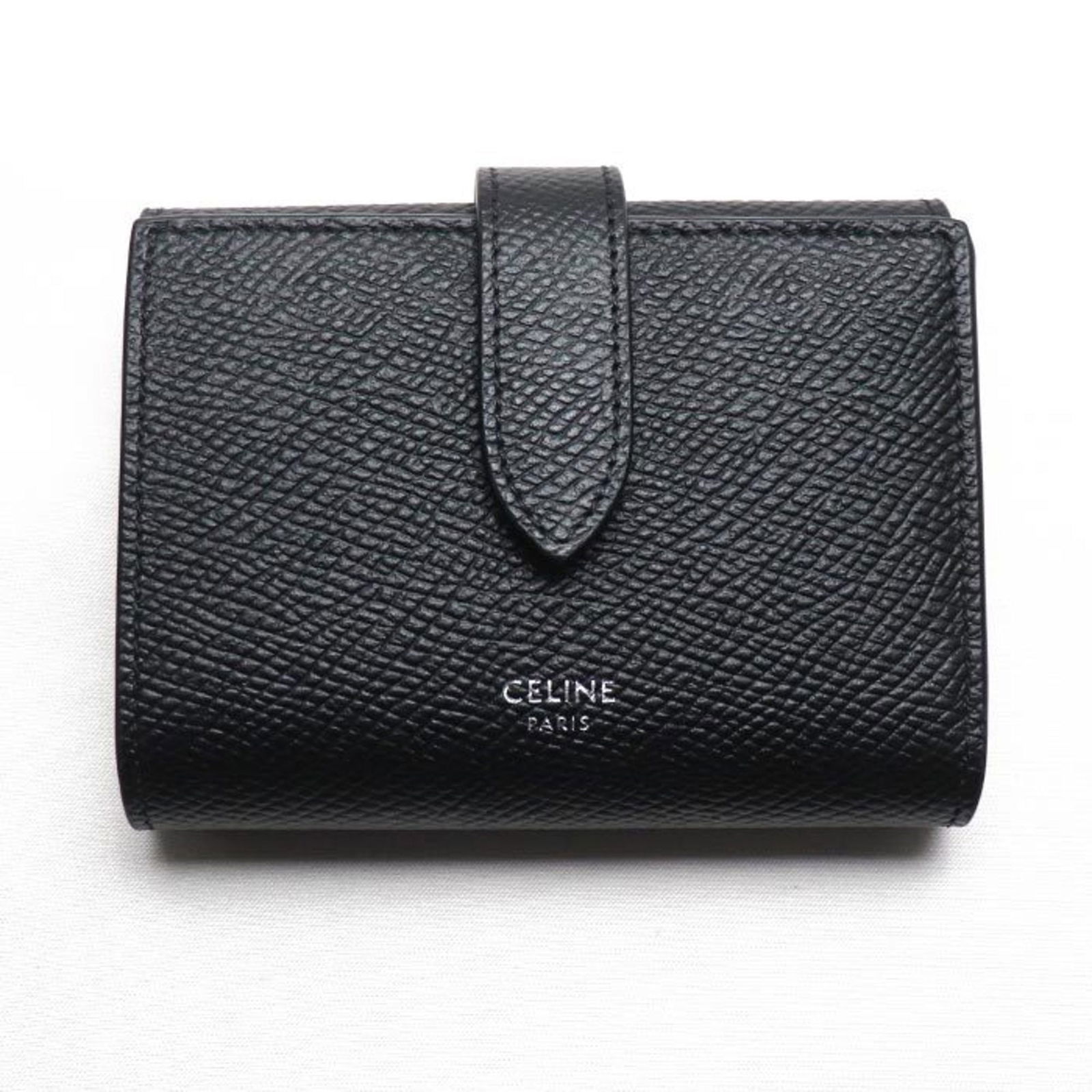 CELINE Fine Strap Wallet Trifold Black 10H483BEL.38SI Women's: CELINE Fine Strap Wallet Trifold Black 10H483BEL.38SI Women's Brand: Celine Model: 10H483BEL.38SI Country of Origin: France Type: Wallet (tri-fold) Gender: Women Color: Black Closure: Snap fastener Si