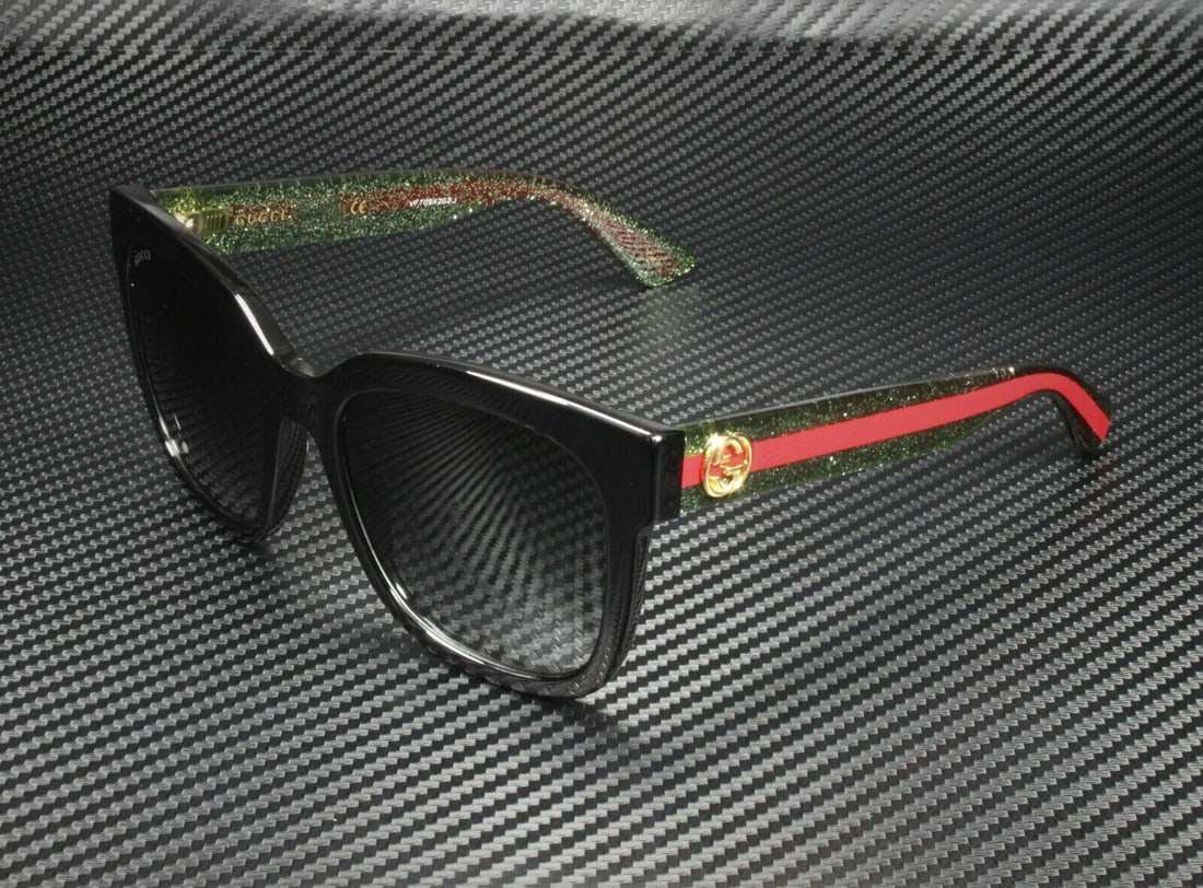 GUCCI GG0034SN 002 Black/Green Square 54 mm Womens Sunglasses: GUCCI GG0034SN 002 Black/Green Square 54 mm Womens Sunglasses Lens Technology: Gradient Frame Color: Black Type: Sunglasses Lens Material: Polycarbonate Style: Square Frame Material: Plastic Nickel Ac