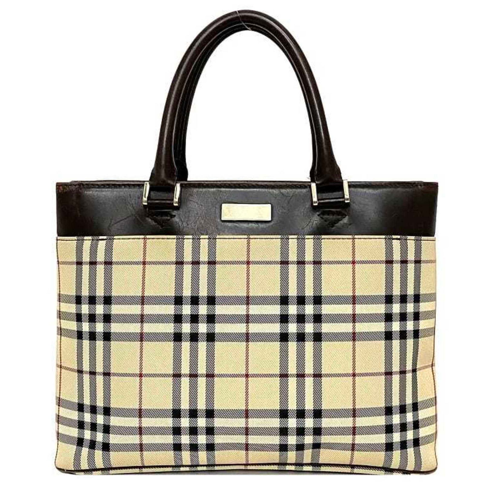 Burberry tote bag beige brown nova check pattern canvas leather BURBERRY: Burberry tote bag beige brown nova check pattern canvas leather BURBERRY Brand: Burberry Model: f-16692 Type: Tote bag Material: Canvas Canvas: Color: Beige brown Brown Closure: Open Outer Pocket: Ope