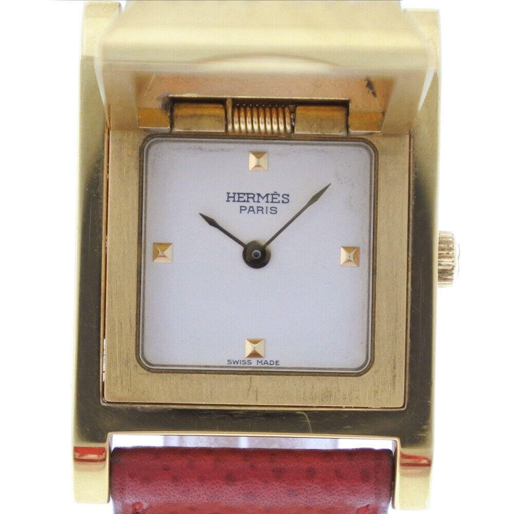 HERMES Medor Ladies Watch: HERMES Medor Ladies Watch Brand HERMES Model name Medor Target ladies Serial 6645** Stamp *Y Material gold plated/leather Color Gold/Red size Case: Approximately H32mm x W23mm (including lugs excludin
