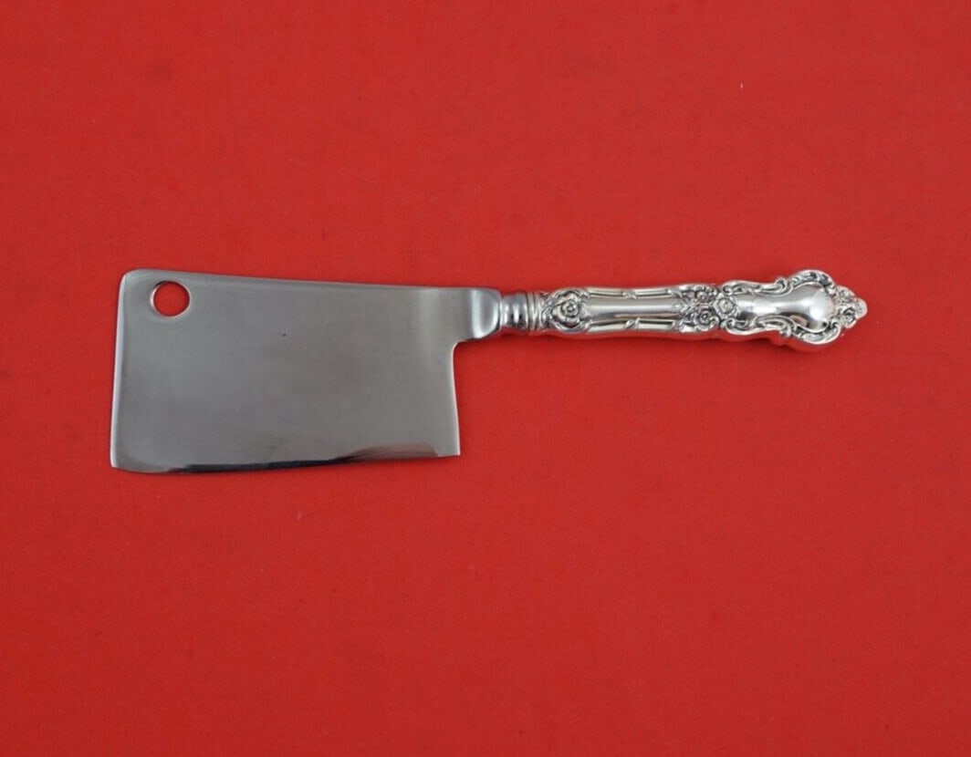 Meadow Rose by Wallace Sterling Silver Cheese Cleaver custom made 6 5/8": Meadow Rose by Wallace Sterling Silver Cheese Cleaver custom made 6 5/8" Meadow rose by wallacesterling silver cheese cleaver, custom made 6 5/8" in the pattern meadow rose by wallace. It is not monog