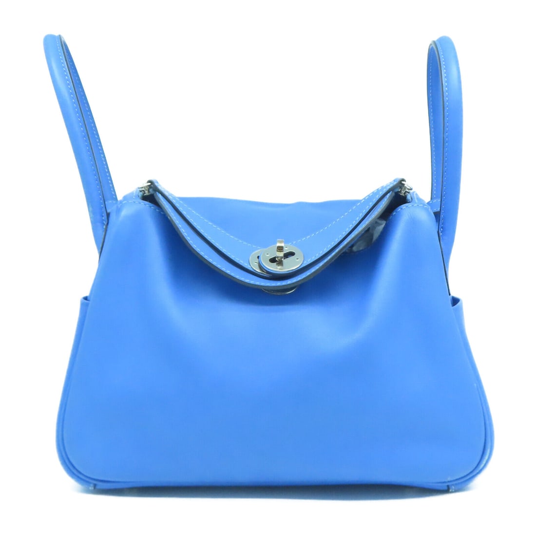 HERMES PHW Lindy 26 2 Way Shoulder Bag Veau Swift Bleu Paradis: HERMES PHW Lindy 26 2 Way Shoulder Bag Veau Swift Bleu Paradis C: Heavily Used The BIDHAUS Guarantee: All items in this auction are guaranteed to be 100% authentic. At Your Service: At BIDHAUS, our Cu