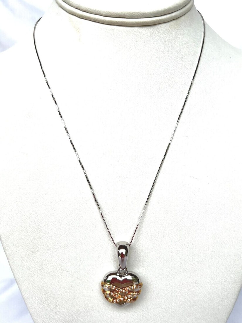 ITALIAN CHIMENTO 18K WHITE GOLD ROSE GOLD DIAMOND NECKLACE PENDANT: ITALIAN CHIMENTO 18K WHITE GOLD ROSE GOLD DIAMOND NECKLACE PENDANT The chain weighs 2 grams and measures 18" long. The pendant weights 10.80 grams measures 1.30" tall 0.8" front and 0.4" deep. It cont