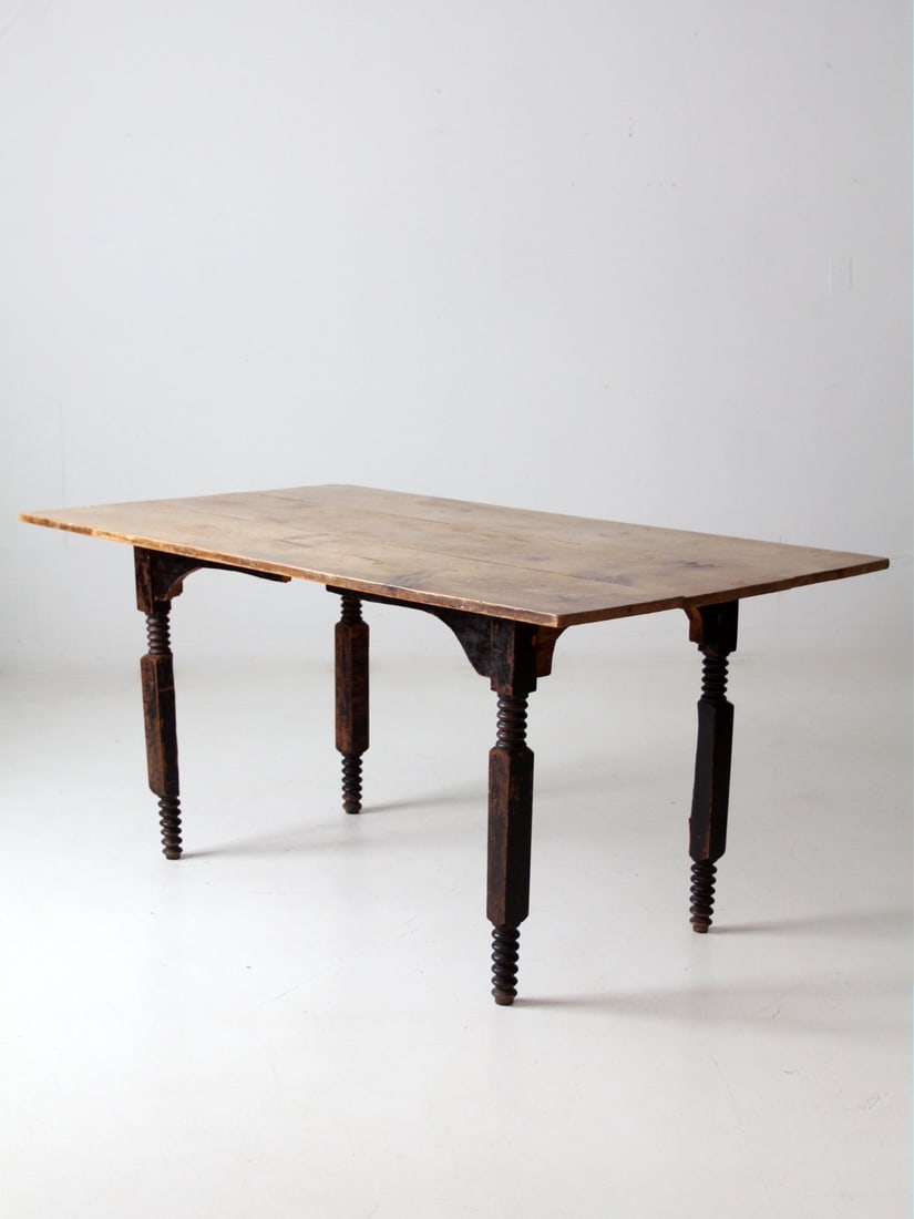 Antique Wood Dining Table: Antique Wood Dining Table This is an antique wooden dining table. The farmhouse table features turned legs and a three plank wood top. Height 29.75 inch 75.6 cm Length 63 inch 160 cm Width 35 inch 88.