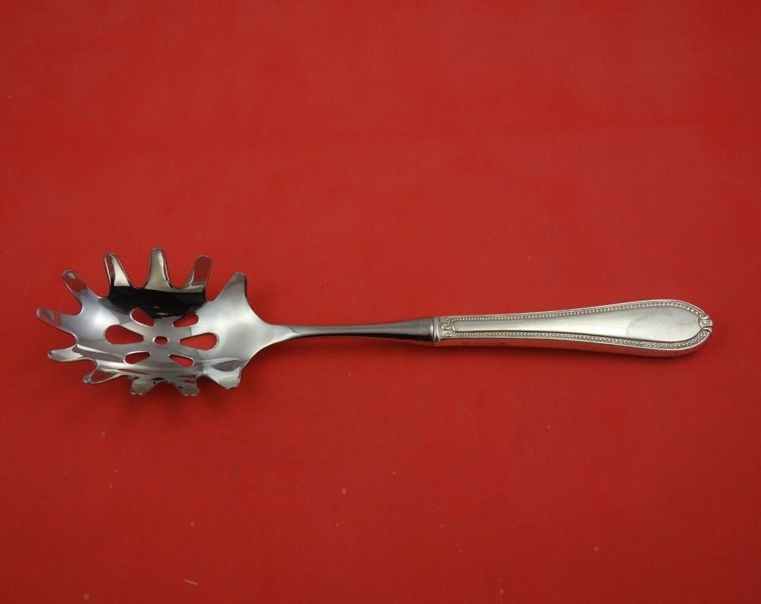 Triumph by Tuttle Sterling Silver Pasta Server HH WS Original 11 1/4" Serving: Triumph by Tuttle Sterling Silver Pasta Server HH WS Original 11 1/4" Serving Triumph by tuttlesterling silver original hollow handle with stainless implement pasta server 11 1/4" in the pattern trium