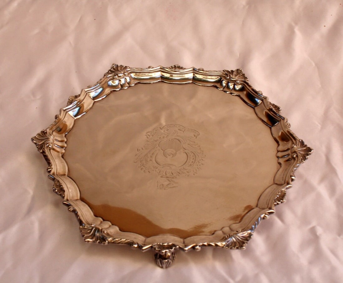 ENGLISH 1834 STERLING SILVER SALVER JOHN WRANGHAM & WILLIAM MOULSON: ENGLISH 1834 STERLING SILVER SALVER JOHN WRANGHAM & WILLIAM MOULSON This is a English 1834 sterling silver salver made by John Wrangham & William Moulson. It measures 11.6" diameter by 1.5" tall. It w