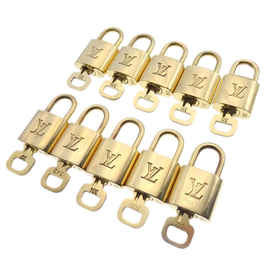 LOUIS VUITTON Padlock & Key Bag Accessories Charm 10 Piece Set Gold: LOUIS VUITTON Padlock & Key Bag Accessories Charm 10 Piece Set Gold Type: Padlock Color: Gold Outside Condition: C: Heavily Used/Inside Condition: C: Heavily Used The BIDHAUS Guarantee: All items in t