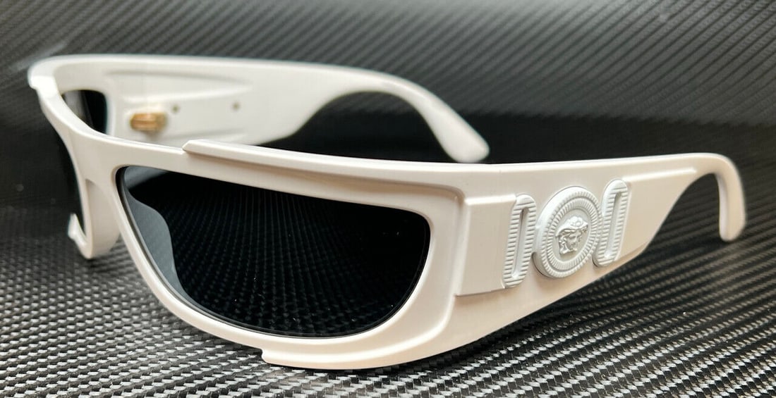 VERSACE VE4446 314 87 White Dark Grey Mens 67 mm Sunglasses: VERSACE VE4446 314 87 White Dark Grey Mens 67 mm Sunglasses Frame Color: White Type: Sunglasses New The BIDHAUS Guarantee: All items in this auction are guaranteed to be 100% authentic. At Your Servic