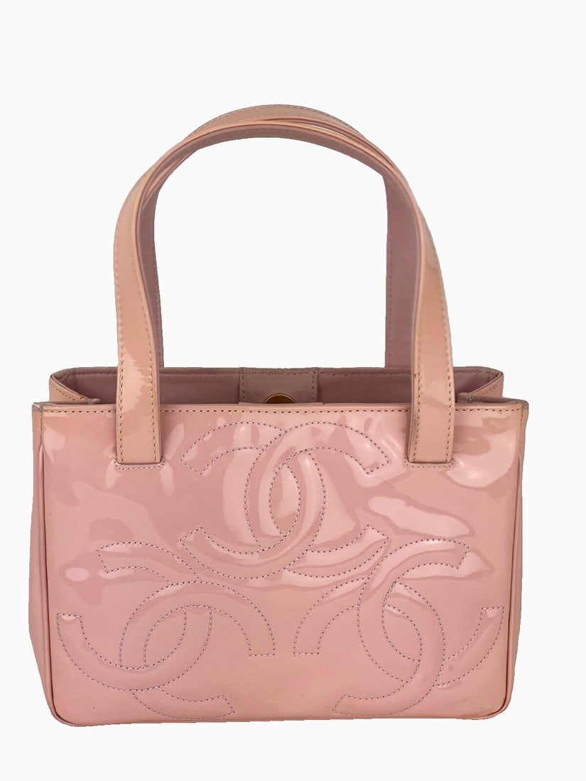 Chanel Bag Triple CC Logo Small Pink Patent Leather Tote Shoulder Bag: Chanel Bag Triple CC Logo Small Pink Patent Leather Tote Shoulder Bag Bag Width: 9"" Shape: Rectangle Closure: Magnetic Handle/Strap Color: Pink Occasion: Casual Formal Party/Cocktail Size: Small Hard