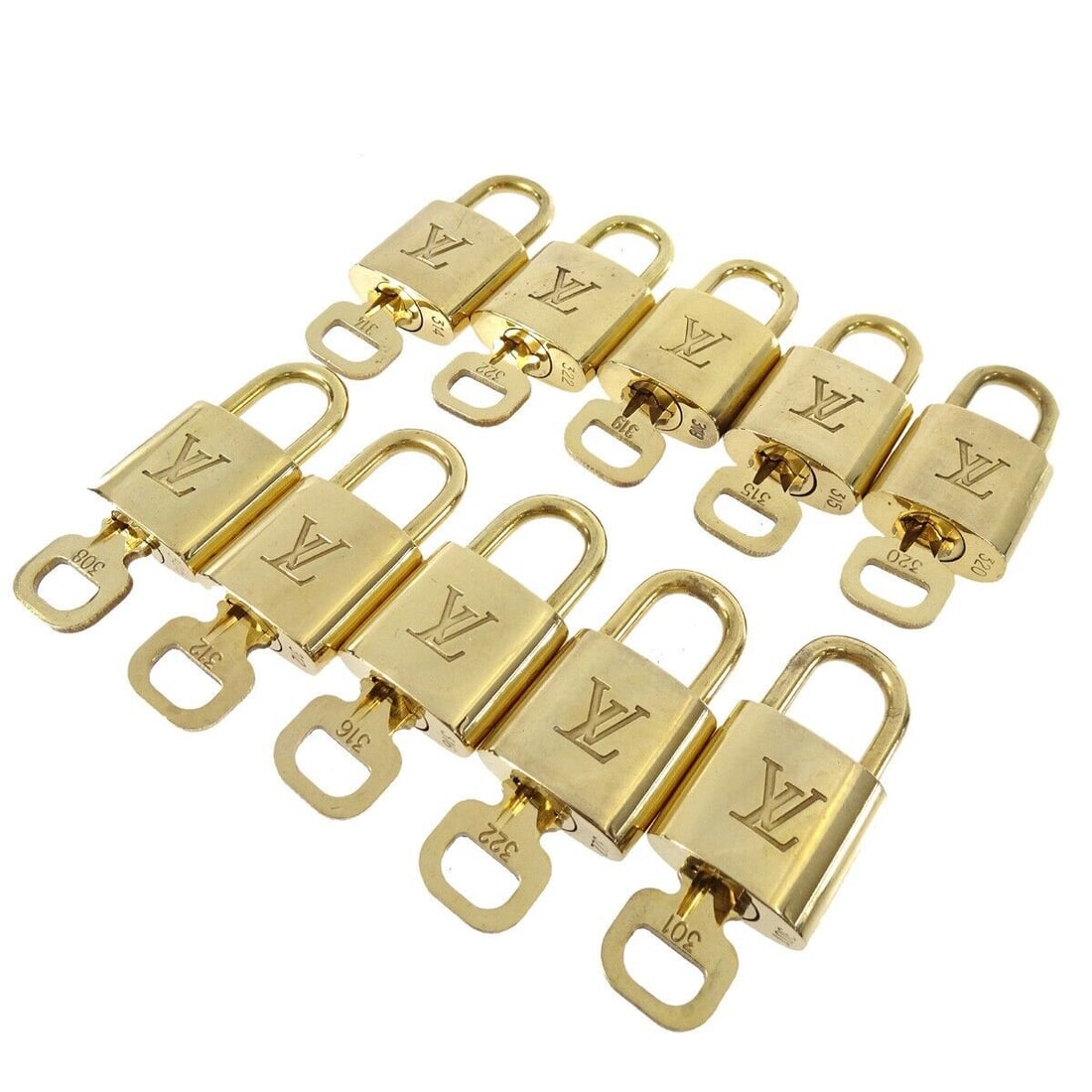 LOUIS VUITTON Padlock & Key Bag Accessories Charm 10 Piece Set Gold: LOUIS VUITTON Padlock & Key Bag Accessories Charm 10 Piece Set Gold Type: Padlock Color: Gold Outside Condition: C: Heavily Used/Inside Condition: C: Heavily Used The BIDHAUS Guarantee: All items in t