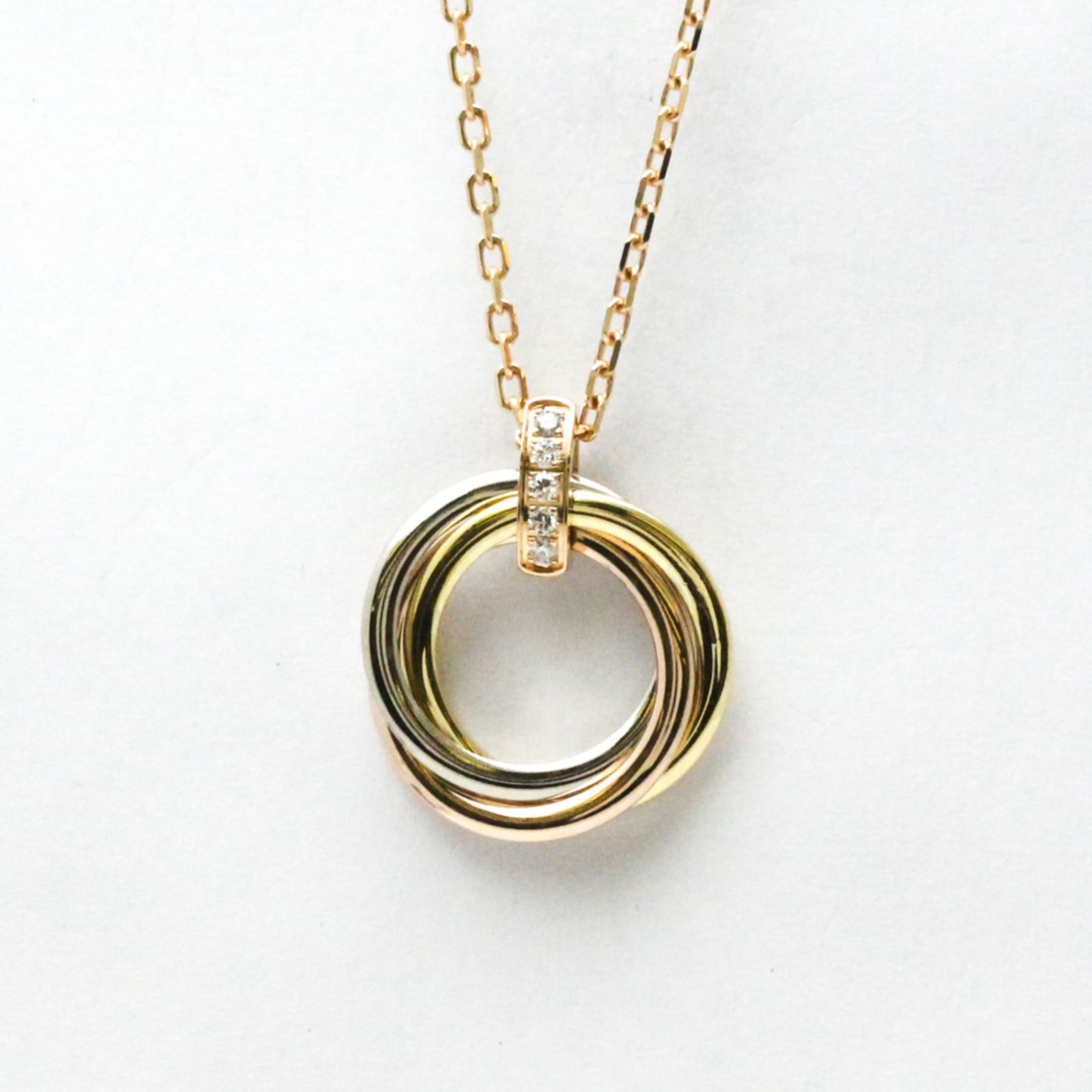 Cartier Trinity De Cartier Pink Gold (18K) White Gold (18K) Yellow Gold (18K) Diamond Men Women: Cartier Trinity De Cartier Pink Gold (18K) White Gold (18K) Yellow Gold (18K) Diamond Men Women Fashion Pendant Necklace (Gold) Brand: Cartier Line: Trinity de Cartier Necklace Type: Pendant necklace