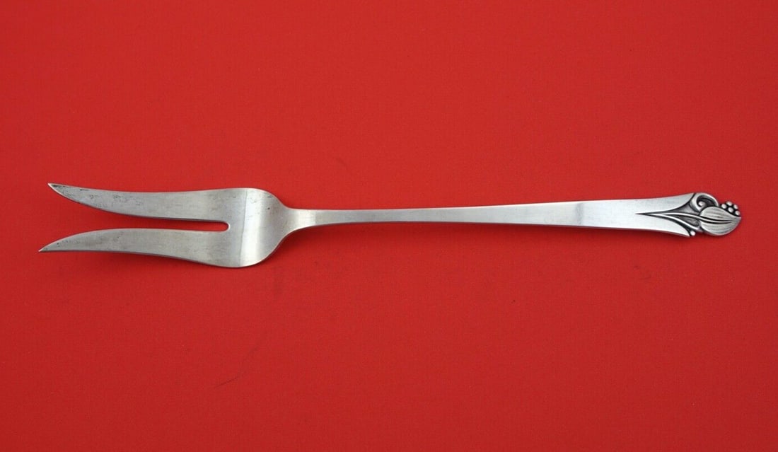 Woodlily by Frank Smith Sterling Silver Salad Serving Fork 2-tine 10 7/8": Woodlily by Frank Smith Sterling Silver Salad Serving Fork 2-tine 10 7/8" Woodlily by frank smithsterling silver salad serving fork, 2-tine 10 7/8" in the pattern woodlily by frank smith. It is not mo