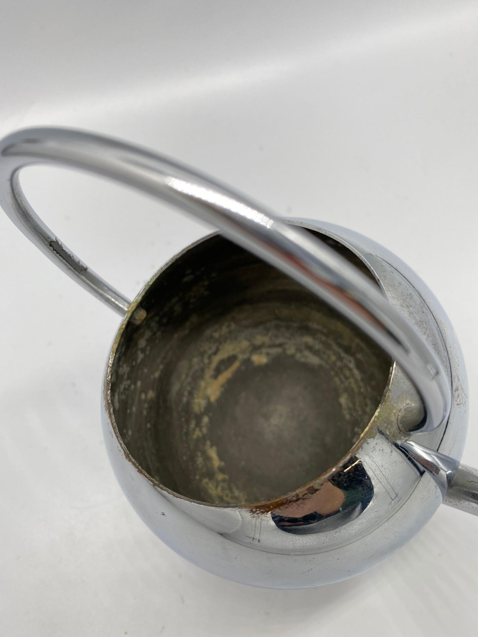 1934 Modernist Small Chrome Syrup Pitcher by Russel Wright for Chase Co.: 1934 Modernist Small Chrome Syrup Pitcher by Russel Wright for Chase Co. Creator: Chase Brass and Copper Company (Manufacturer) Dimensions: Height: 5.3 in (13.47 cm)Diameter: 2 in (5.08 cm) Materials