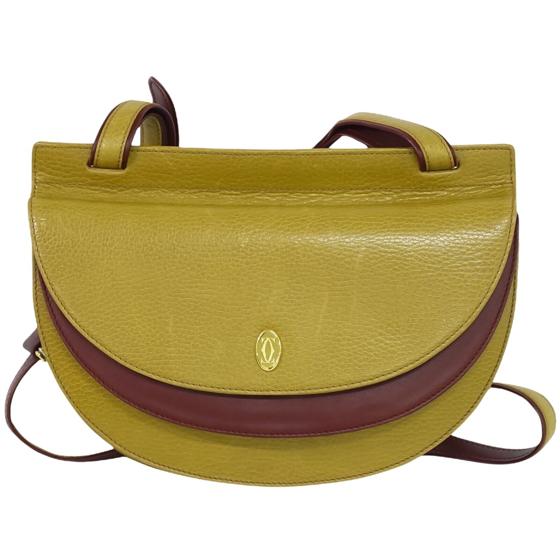 Cartier Must de Cartier: Cartier Must de Cartier Brand: Cartier Model: Must de Cartier Color: Yellow Material: Leather Dimensions: W 26 x H 19 x D 4 cm Comments: If you appreciate a casual modern look this bag from Cartier is