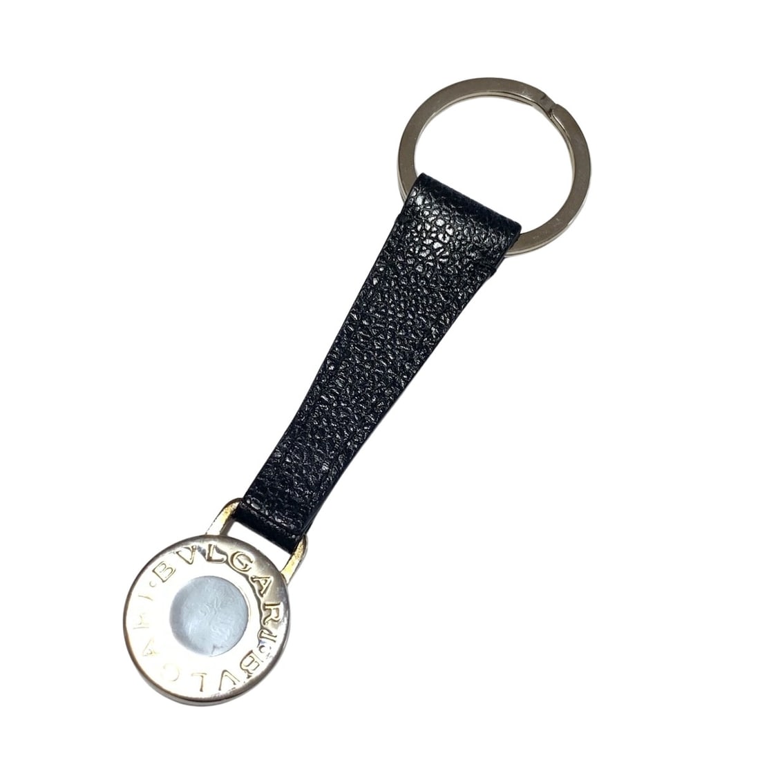 Bulgari Bulgari Bulgari: Bulgari Bulgari Bulgari Brand: Bulgari Model: Bulgari Bulgari Color: Black Material: Leather Dimensions: height width : ~ 11.5 cm 3 cm Comments: BVLGARI "BVLGARI" brand key ring in leather and metal i