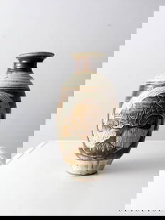 Vintage Studio Pottery Vase: Vintage Studio Pottery Vase This is a large vintage studio pottery vase. Signed by the artist the hand-crafted vase features a speckled brown glaze with a hand-carved tree design. Height 15 inch