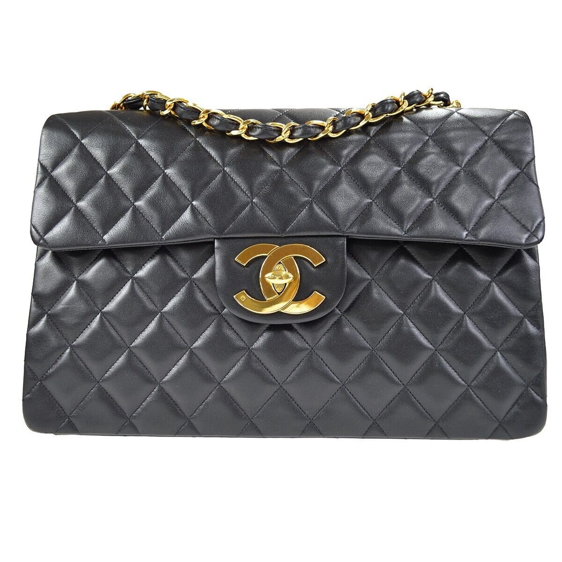 Chanel Black Lambskin Maxi Classic Flap Bag: Chanel Black Lambskin Maxi Classic Flap Bag Bag Width: 13 in Pattern: Matelasse Bag Height: 9 in Closure: Turn Lock Occasion: Casual Size: Large Handle Style: Shoulder Strap Lining Material: Leather B