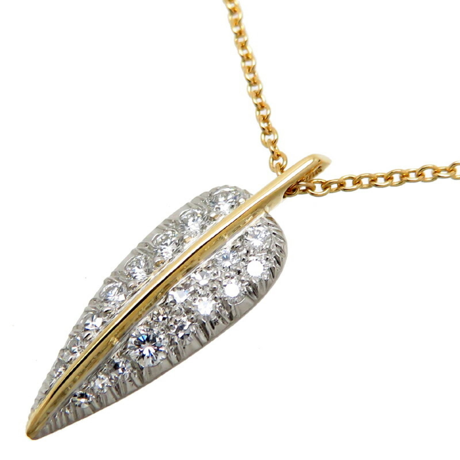 Tiffany Leaf Diamond Women's Necklace 750 Yellow Gold: Tiffany Leaf Diamond Women's Necklace 750 Yellow Gold Brand: Tiffany Necklace Type: Necklace Gender: Women Material: Platinum 950 Yellow gold (18K) Stone: Diamond Weight: 2.7g / 0.09oz. Neck Circumfer