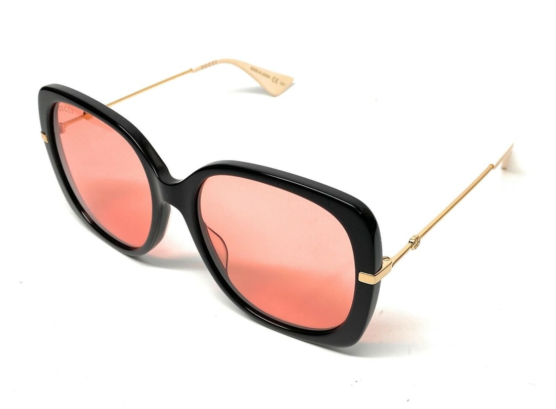 GUCCI GG0511S 002 Rectangular Square Black Womens Sunglasses 57 mm: GUCCI GG0511S 002 Rectangular Square Black Womens Sunglasses 57 mm Type: Sunglasses Frame Color: Black Style: Square Lens Color: Red Features: Oversized Lightweight Frame Material: Plastic Acetate Len