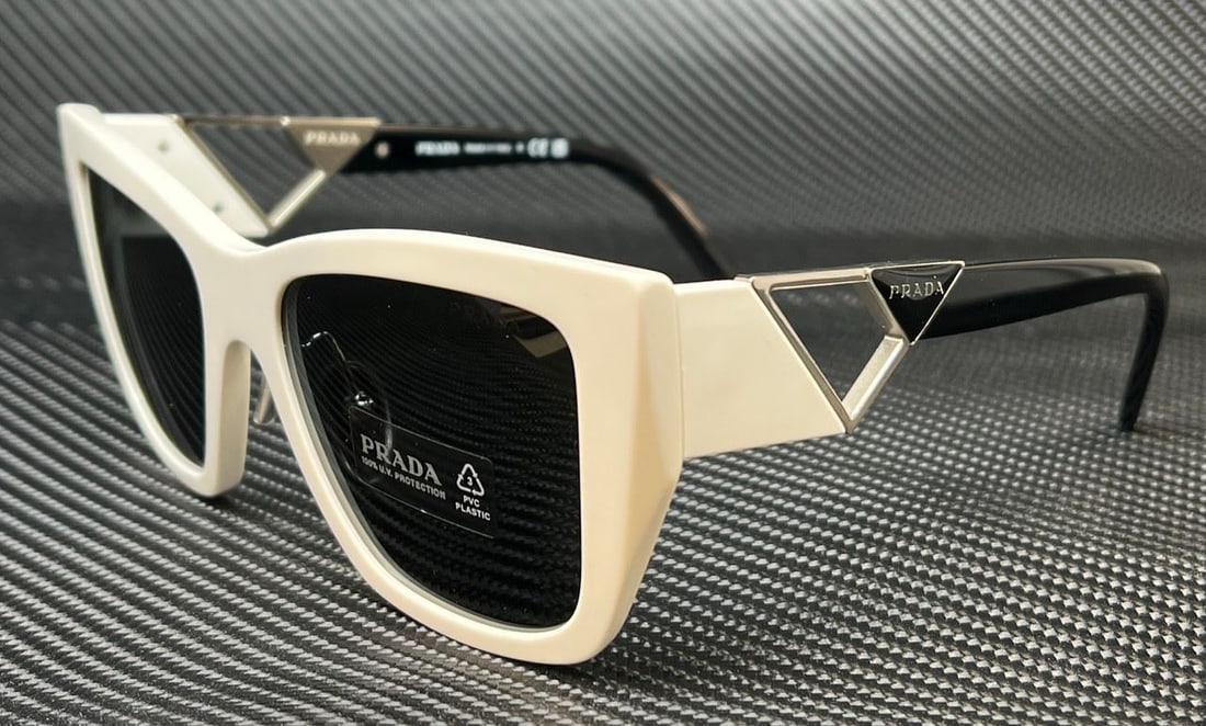 PRADA PR 21YS 1425S0 White Grey Womens 54 mm Sunglasses: PRADA PR 21YS 1425S0 White Grey Womens 54 mm Sunglasses Frame Color: White Type: Sunglasses New The BIDHAUS Guarantee: All items in this auction are guaranteed to be 100% authentic. At Your Service: A