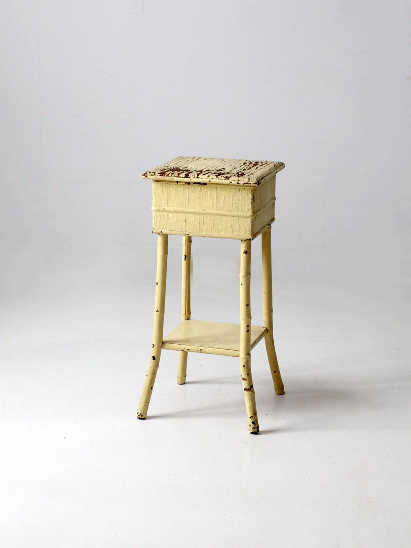 Antique Bamboo Side Table With Storage Top: Antique Bamboo Side Table With Storage Top This is an antique painted bamboo side table. Pastel yellow paint colors the woven grasscloth and bamboo table. Often called "sewing box tables" the accent t